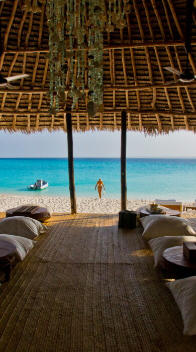 Inside beach hut view of Zanzibar beach and ocean, Tanzania - Yellow Zebra Safaris