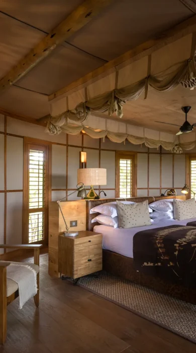 Interior bedroom view on free standing double bed, Mombo, Moremi Game Reserve, Botswana - Yellow Zebra Safari