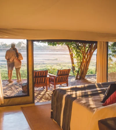 couple in camp, the original south luangwa camps, zambia trips