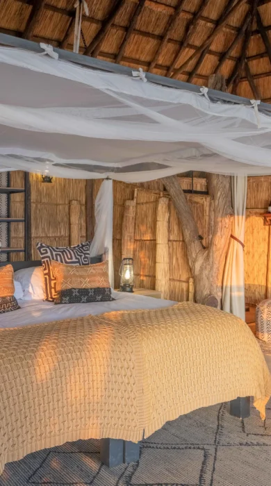 bed, time and tide kakuli bush camp, south luangwa national park, zambia