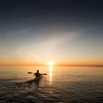 sea kayaking sunset unsplash yellow zebra safaris