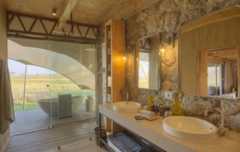 bathroom namiri plains tanzania yellow zebra safaris