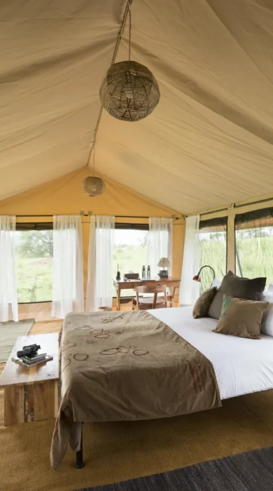 bedroom interior, nyikani camp central serengeti, tanzania