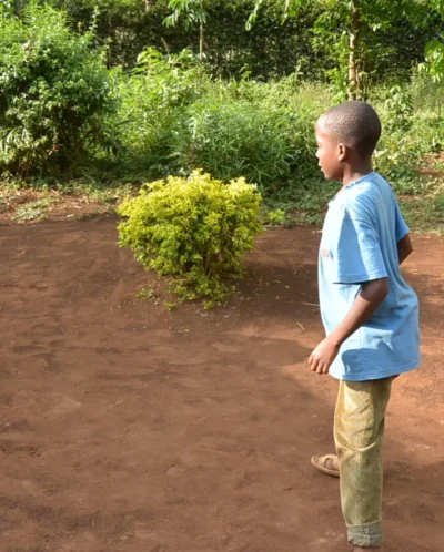 Local children play football - Yellow Zebra Safaris