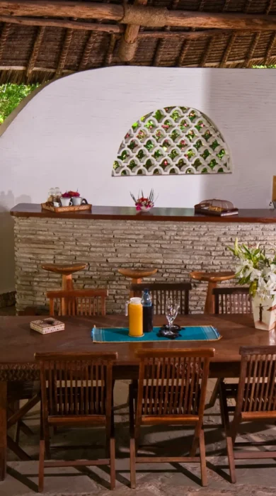 waterlovers villa dining kenya yellow zebra safaris
