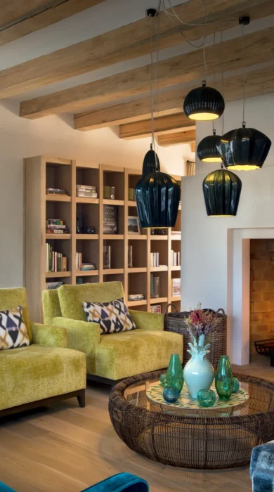 Morukuru Ocean House lounge with fireplace
